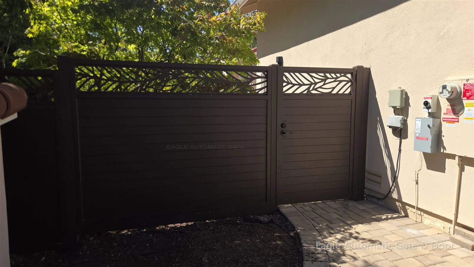 Completed side gate and privacy fence beside the house