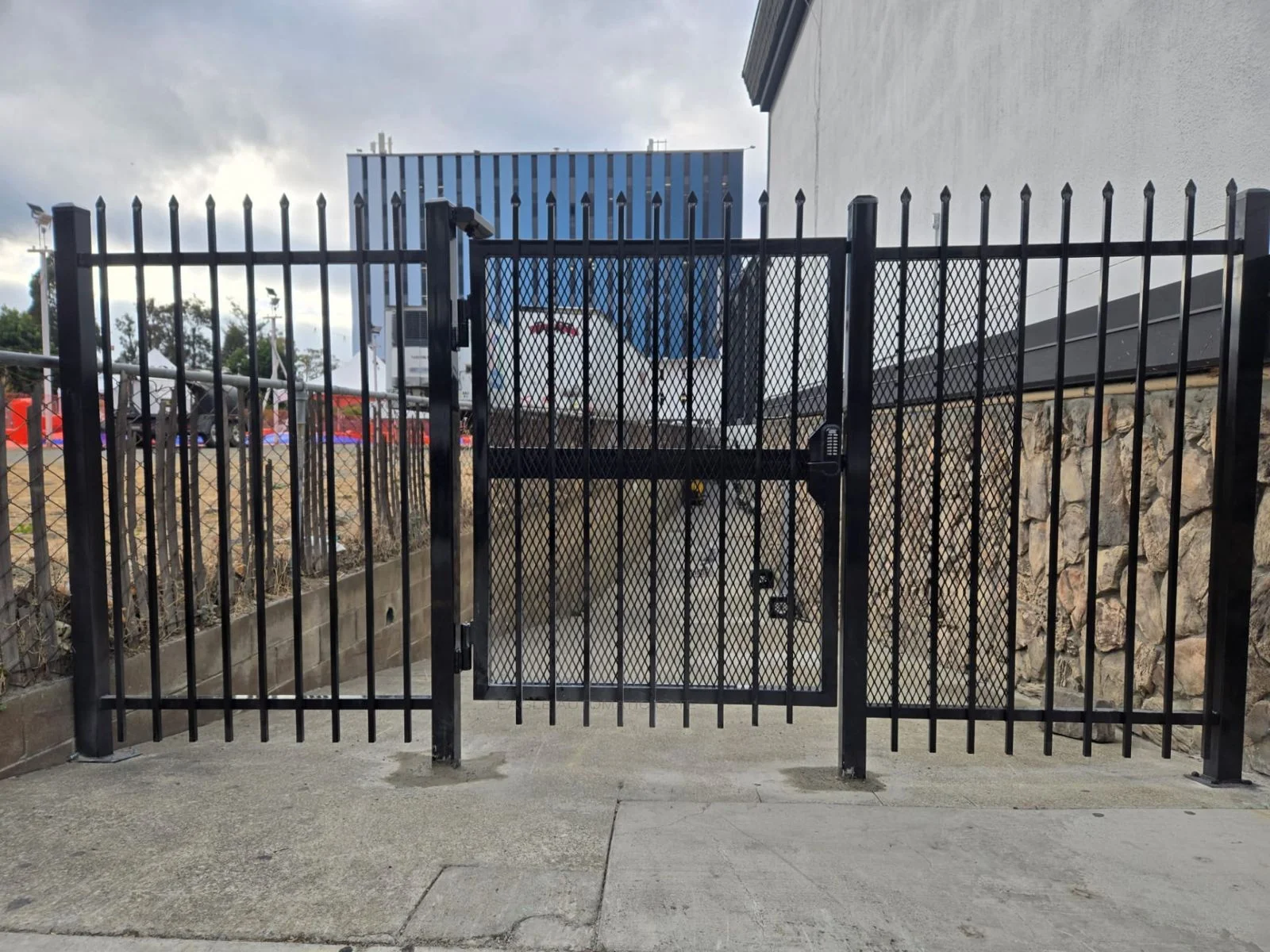 Completed anti-climb security gate at a commercial entrance