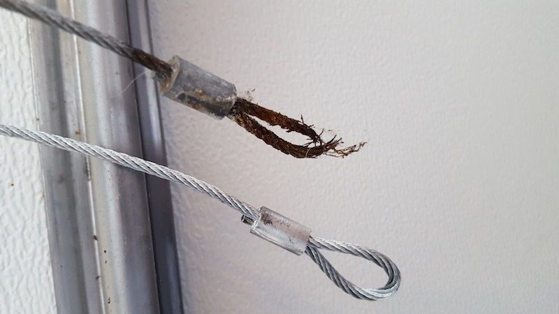 how to replace garage door cable