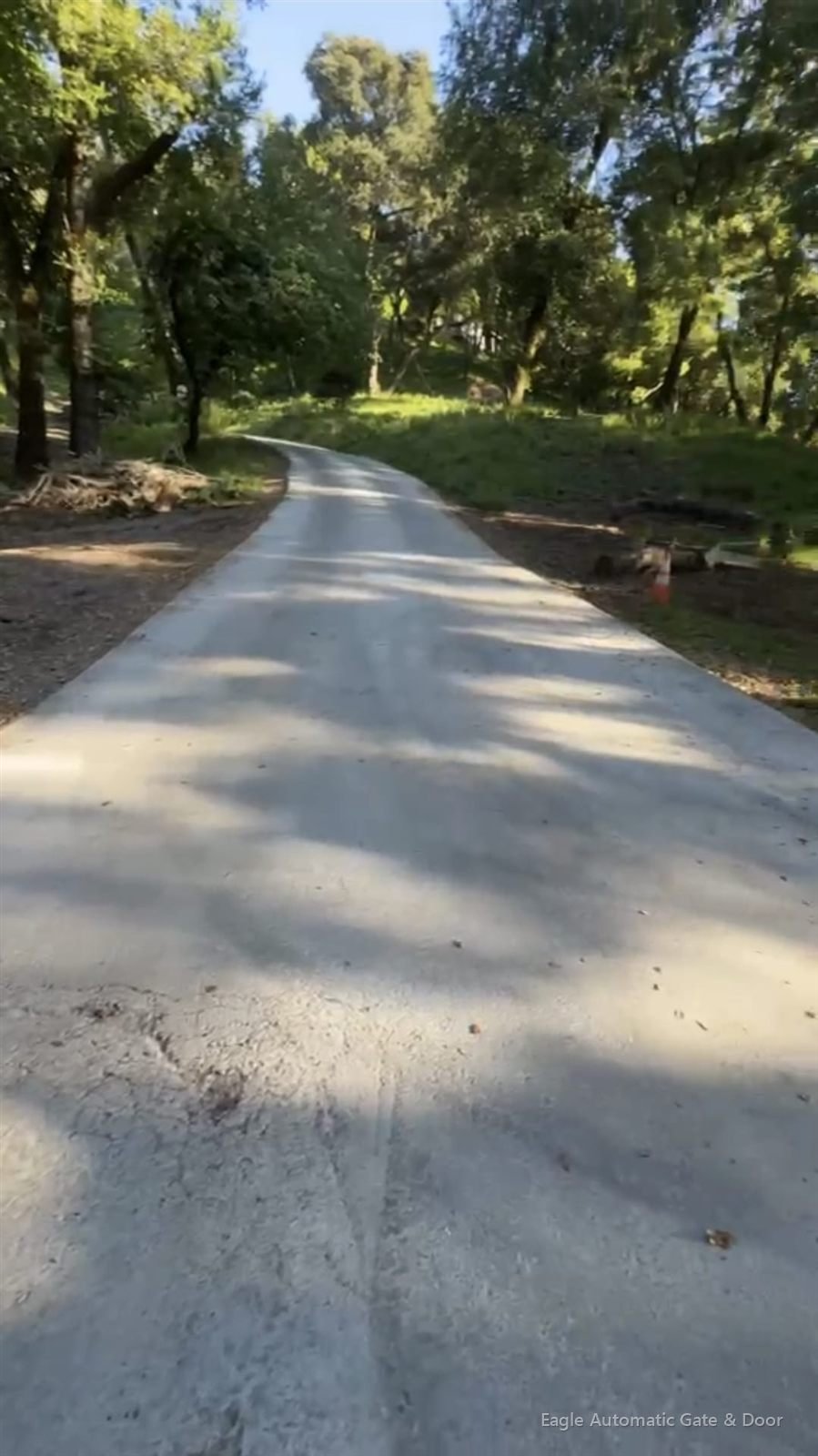 Woodside uphill driveway before the automatic gate